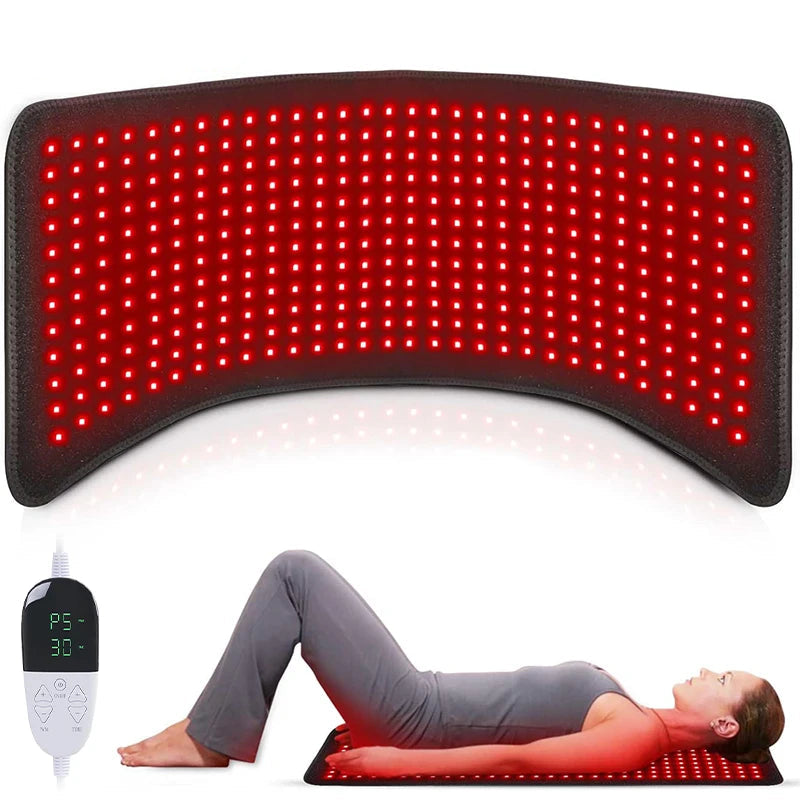 Red LED pad with a woman lying on it.